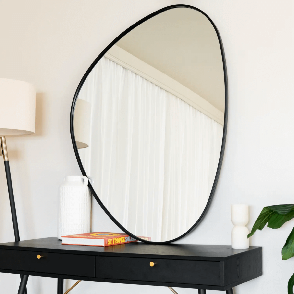 Izumi Black Metal Irregular Pebble Mirror - Elegant Statement for Modern Spaces