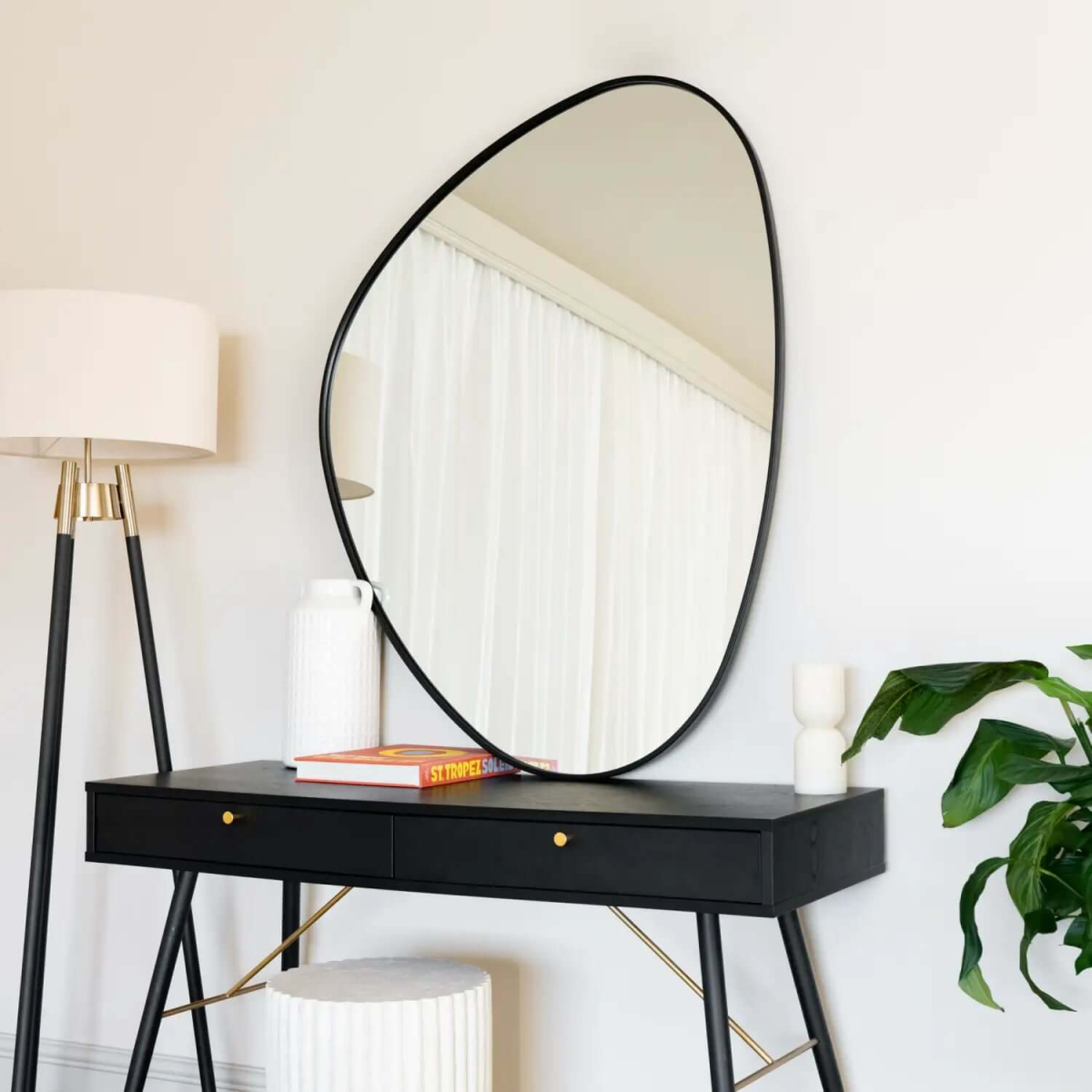 Izumi Black Metal Irregular Pebble Mirror - Elegant Statement for Modern Spaces